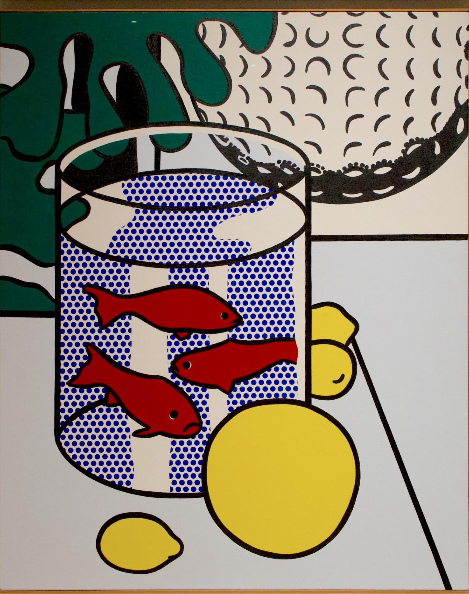 A still life with a bowl of red goldfish and yellow fruit