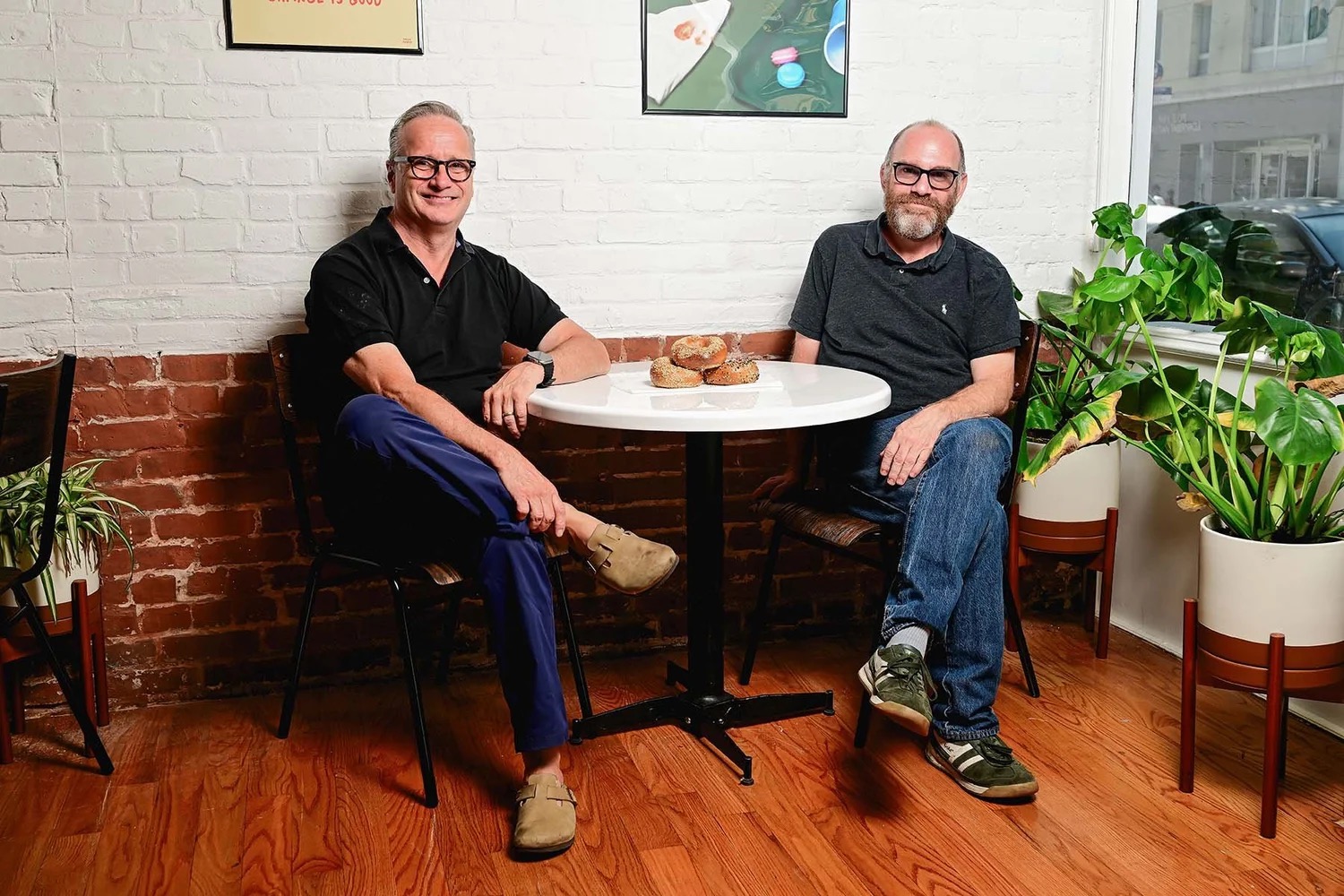 Caputo Bagels founders James and Rafi inside the Park Slope shop