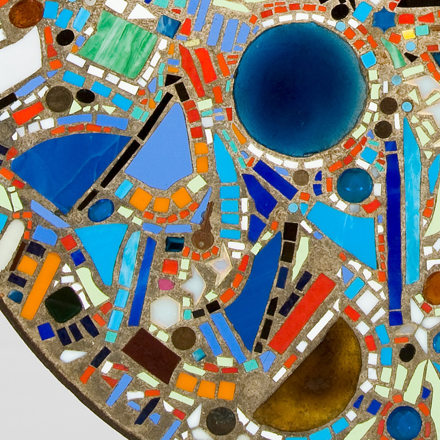 Close-up of Krasner's Mosaic Table showing blue glass and tesserae